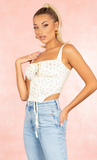 Sweet Mystery Yellow Floral Pattern Ruched Sleeveless Tie Front Bustier Asymmetric Hem Crop Top